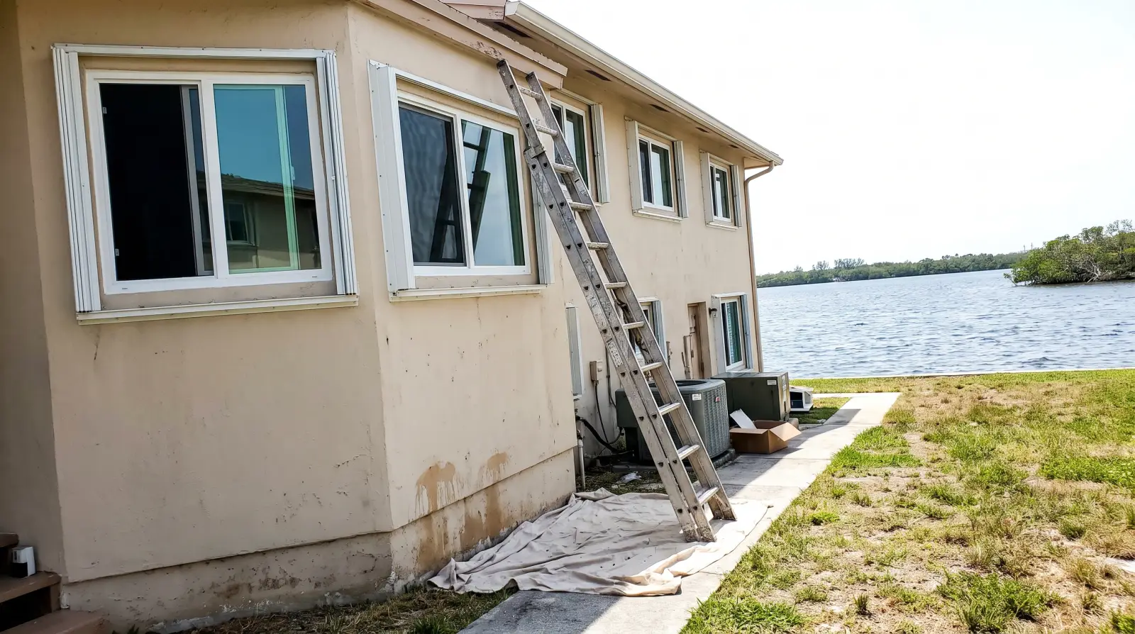 Impact windows on a townhouse near the Lake Worth Lagoon in Hypoluxo, FL