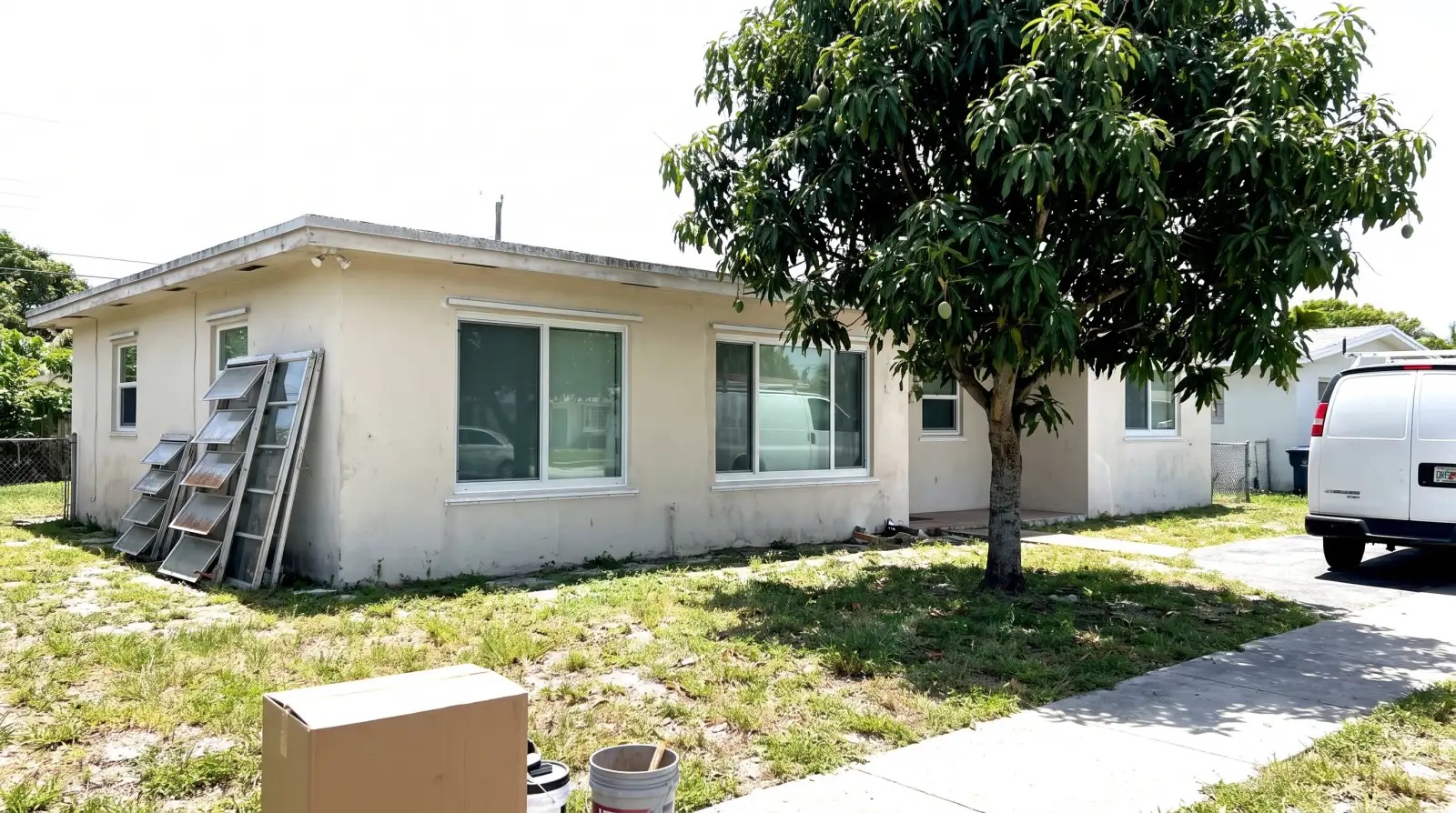 Impact windows on a mid-century home in Lake Park, FL