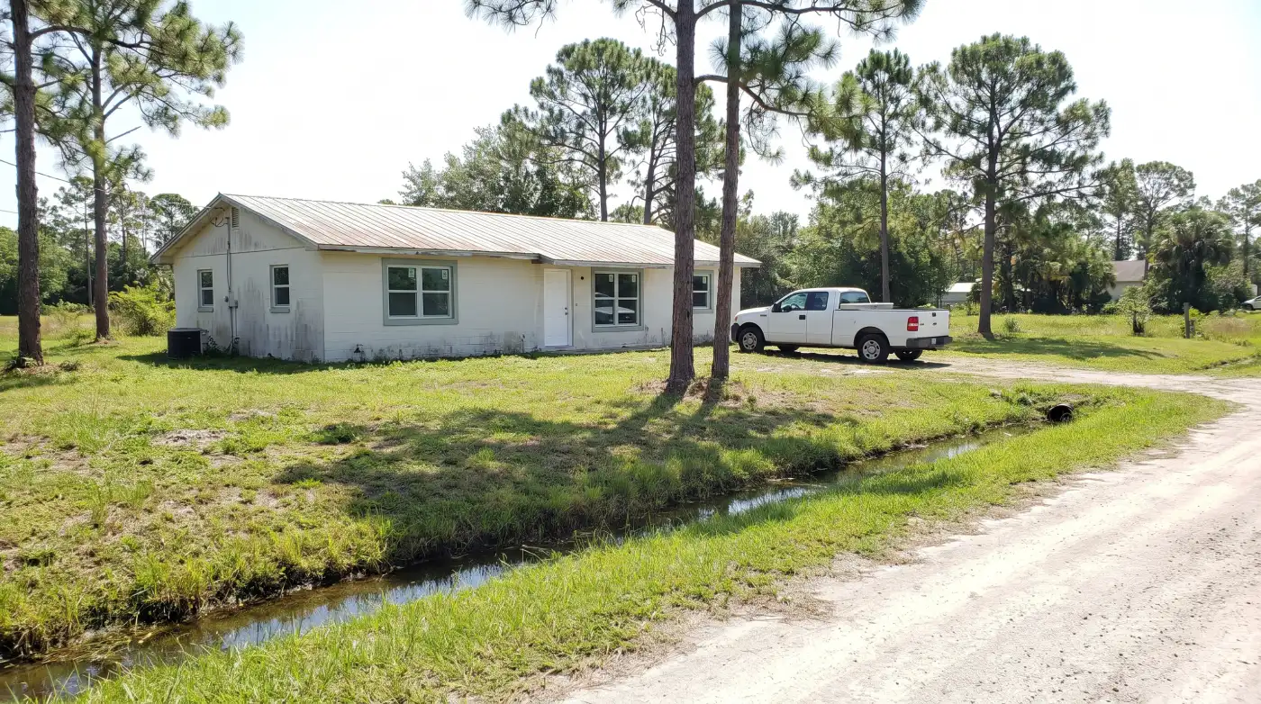 Impact windows on a rural single-family home on a large lot in Loxahatchee Groves, FL