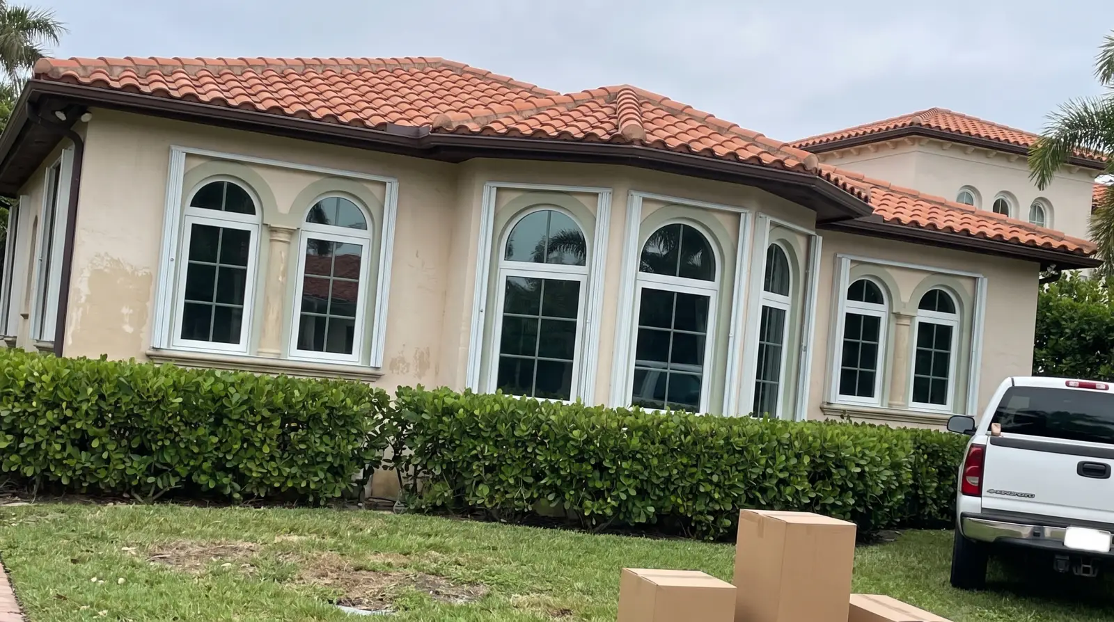 Impact windows on a Mediterranean Revival home in Palm Beach, FL