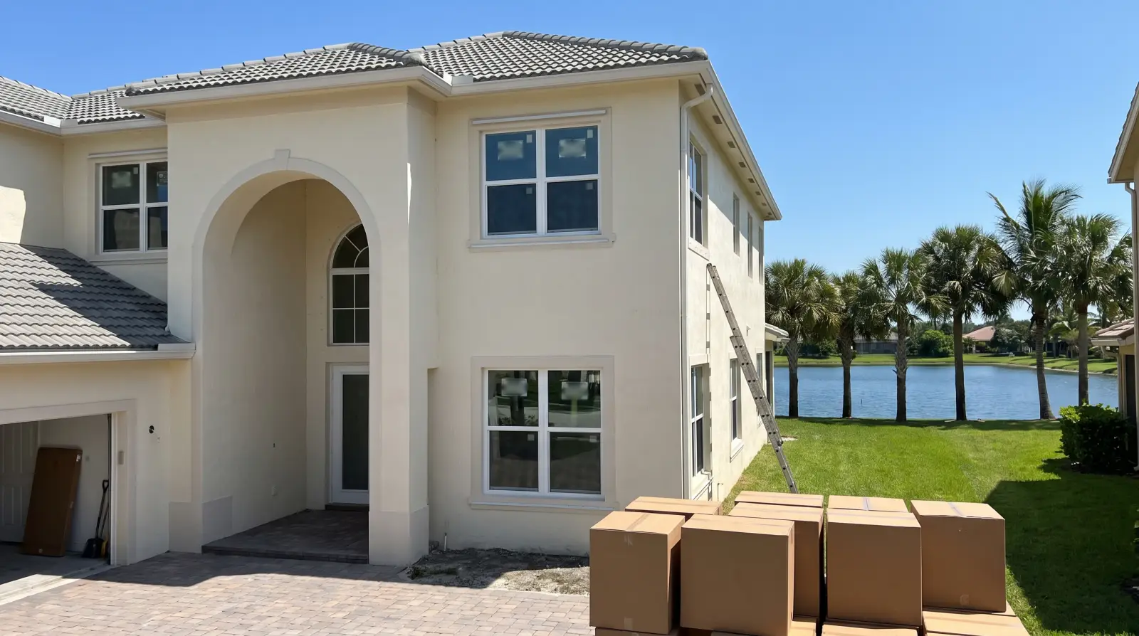 Impact windows on a large two-story home in Parkland, FL