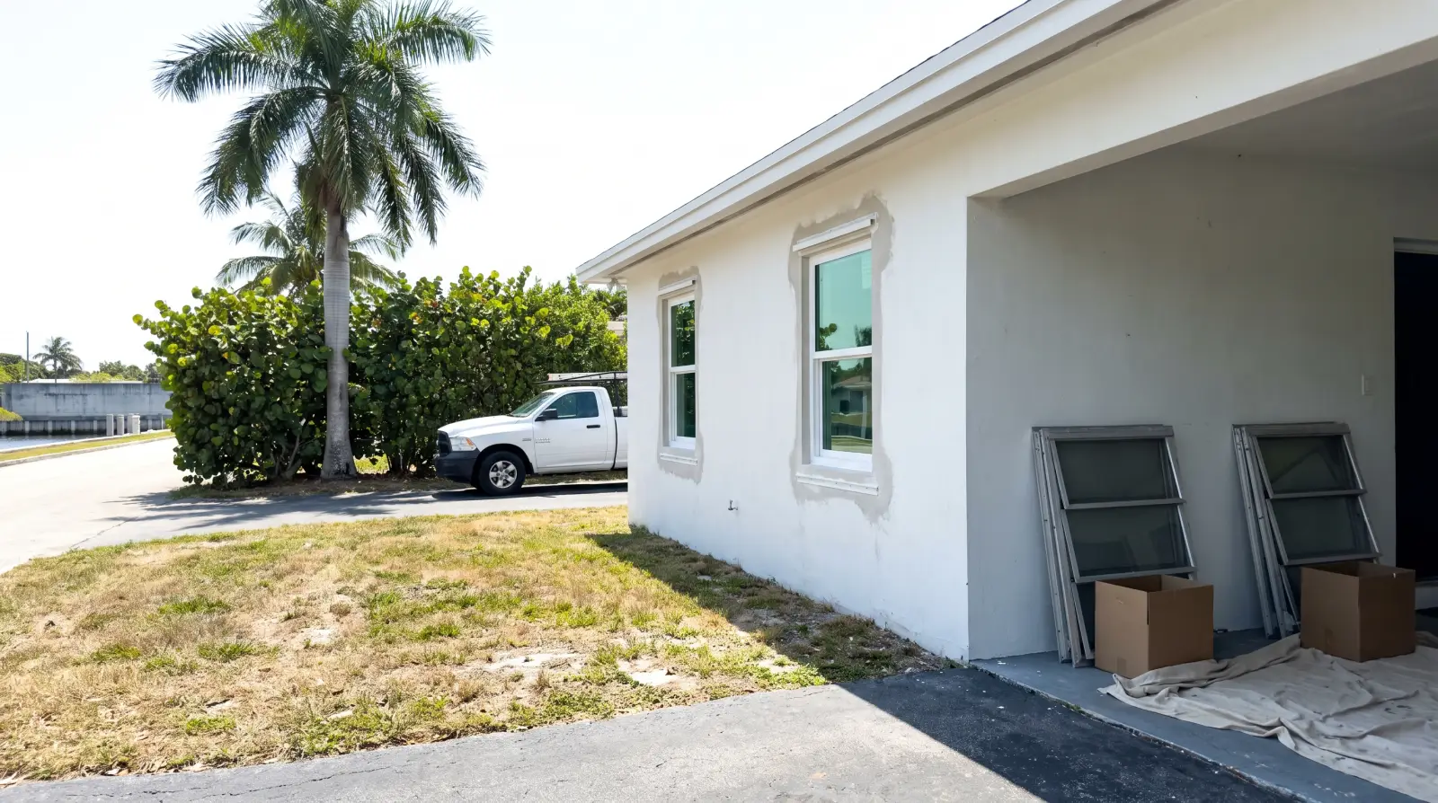 Impact windows being installed on a 1970s single-family home in Fort Lauderdale, FL