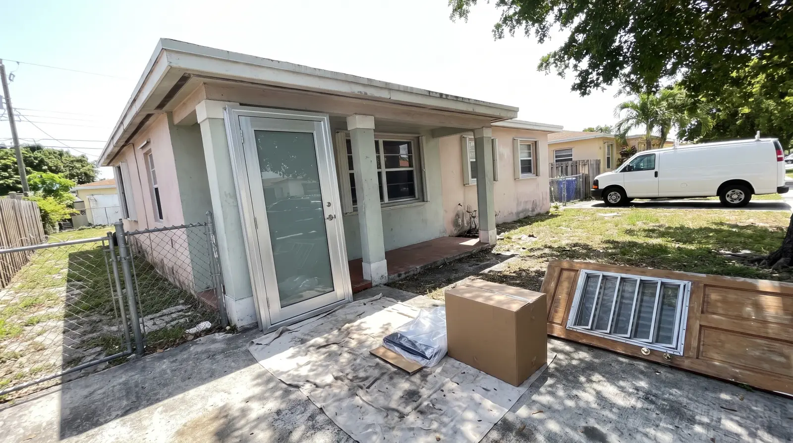 Impact front door on a concrete-block home in Hialeah, FL