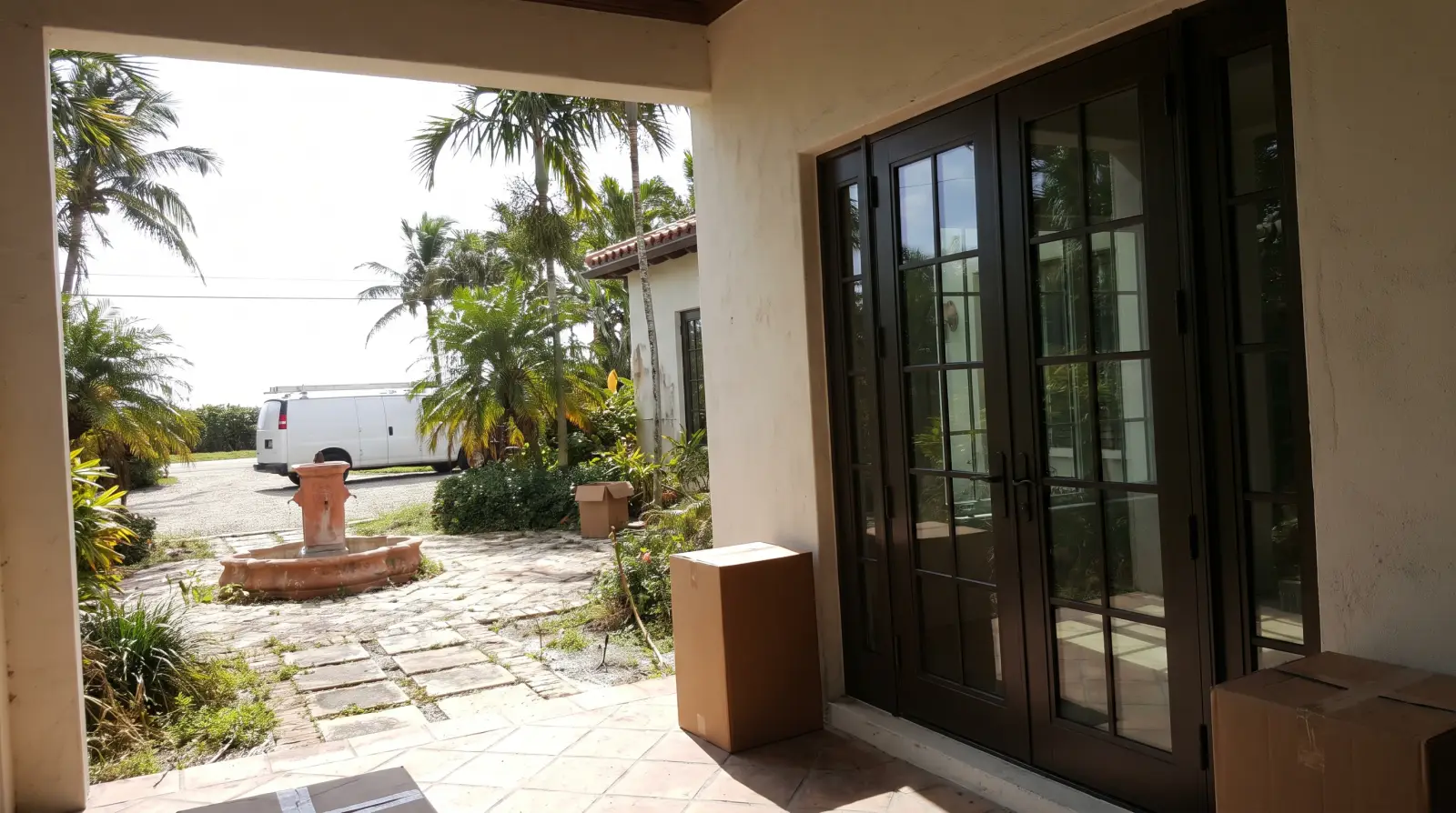 Impact French doors on a Mediterranean Revival home in Palm Beach, FL